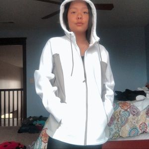 White zip up jacket with a hoodie by SwissTech